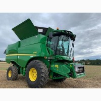 Комбайн зернозбиральний John Deere S680 і