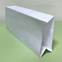 Белые бумажные крафт-пакеты 110х60х290мм по 90 коп./шт
