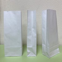 Белые бумажные крафт-пакеты 110х60х290мм по 90 коп./шт